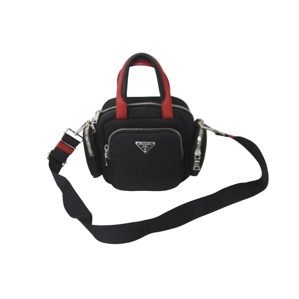 PRADA handbag triangular logo plate leather black red